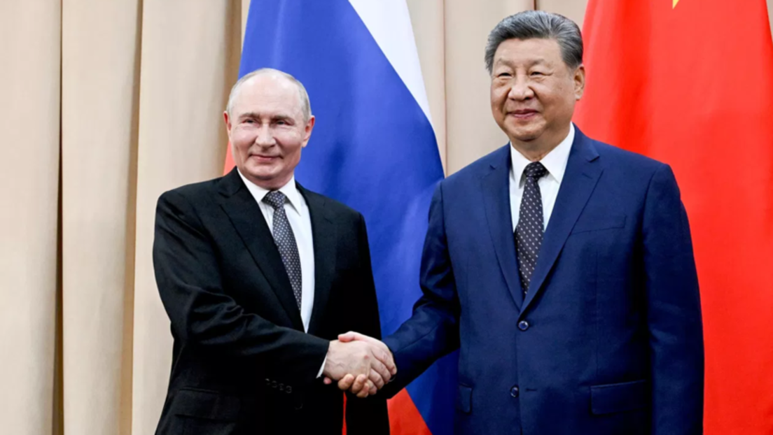 普京会见中国国家主席习近平